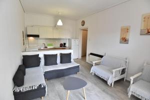 A kitchen or kitchenette at Luca Apartments