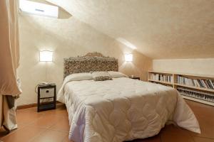 Ένα ή περισσότερα κρεβάτια σε δωμάτιο στο H11 [Villa Conchiglia] Piscina - Garage
