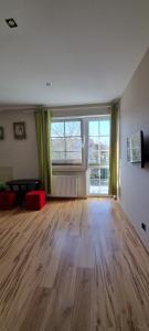 TV a/nebo společenská místnost v ubytování Pokoje w Zielonym Domku + 18 fotografií