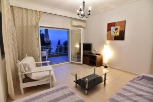 A bed or beds in a room at Luca Apartments