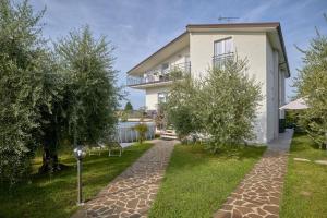 A garden outside App. Mimosa Minerva Holiday Home