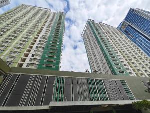 two tall buildings standing next to each other at Cebu Avida Riala T4 2320 IT Park in Cebu City