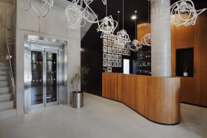 The lobby or reception area at Fabrika Hotel