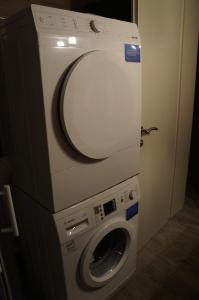 a washer and dryer in a room at Zen Den Zaboric in Zaboric