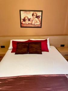 Una cama o camas en una habitación de Hotel Algo