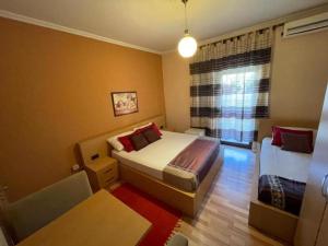 Una cama o camas en una habitación de Hotel Algo