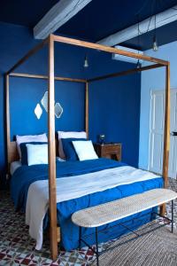 En eller flere senge i et værelse på Mas Gardane
