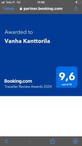 Capture d'écran d'un téléphone portable avec le site web theania karma karma dans l'établissement Vanha Kanttorila ,Huone B pohjakerroksessa, à Lovisa