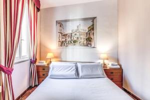 Posteľ alebo postele v izbe v ubytovaní Cozy flat in Trevi Fountain