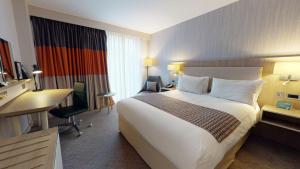 Ліжко або ліжка в номері Holiday Inn Manchester - City Centre by IHG