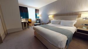 Ліжко або ліжка в номері Holiday Inn Manchester - City Centre by IHG