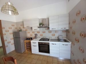 Køkken eller tekøkken på Residence Carlini
