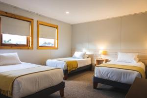 Giường trong phòng chung tại Hotel FioFio SPA