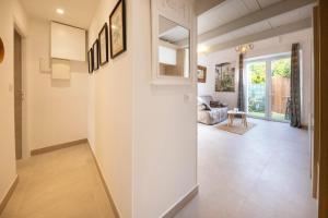 a hallway of a home with white walls at 06Y1 - Beautiful modern T2 with terrace Juan-les-Pins in Juan-les-Pins