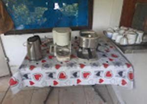 a table with pots and pans on top of it at Варвара- Ятрус in Varvara +22 photos
