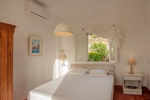 Giường trong phòng chung tại Villa Armonia