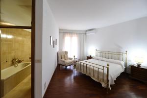 Ένα ή περισσότερα κρεβάτια σε δωμάτιο στο Casa Giovanna +46 φωτογραφίες