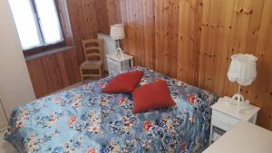 Postel nebo postele na pokoji v ubytování Casa Aldobrandesca
