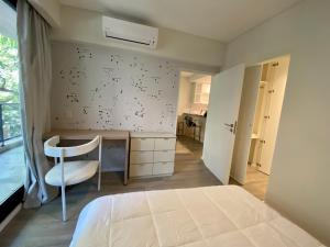 The best Apartment in Cañitas - Buenos Aires tesisinde bir odada yatak veya yataklar