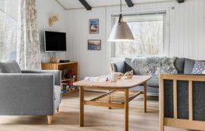 TV a/nebo společenská místnost v ubytování Holiday Home Nøddehaven Iii