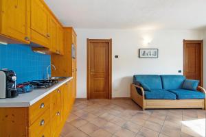 Kuchyň nebo kuchyňský kout v ubytování Residence Larice Bianco App n5