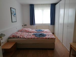 Ένα ή περισσότερα κρεβάτια σε δωμάτιο στο Ostseetraum Usedom