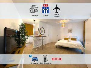 a room with a bed and a table and a tv at Les Entrepreneurs - Appartements neufs et spacieux, proche RER C et Aéroport Orly in Morangis