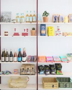 a pantry with shelves filled with food and drinks at Lermooser in Lermoos