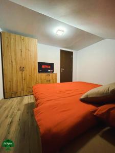 Ліжко або ліжка в номері La Stejaru