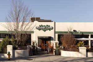 a restaurant with a sign on the side of a building at Kasa Downtown Asheville in Asheville +56 photos