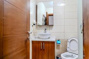 a bathroom with a sink and a toilet at City Hall Apart Hotel Sultanahmet in Istanbul +44 photos