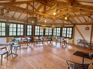 A restaurant or other place to eat at The Legends , Art & Forest