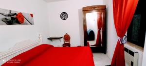 A bed or beds in a room at DIMORA IL CAMALEONTE apartments in nature with pool