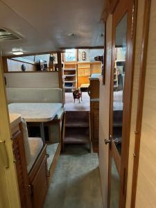 a small room with a dog sitting in the middle at Annapolis Boat Life - Overnight Stays in Annapolis