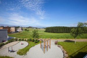 an aerial view of a park with a playground at Wonderful appartement with a nice view. Parking! in Sola
