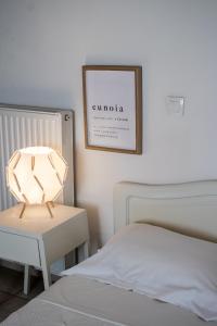 Postel nebo postele na pokoji v ubytování Nectar Apartments