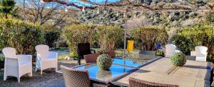 A garden outside DIMORA IL CAMALEONTE apartments in nature with pool