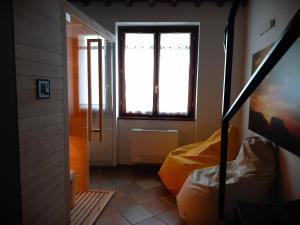 Postel nebo postele na pokoji v ubytování Antico Borgo Carceri & Wellness
