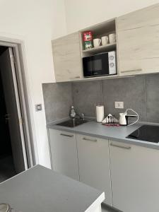 A kitchen or kitchenette at URBAN Apartments