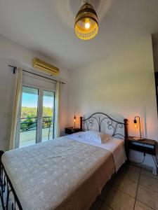 Postel nebo postele na pokoji v ubytování Nectar Apartments