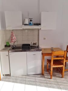 Kuchyň nebo kuchyňský kout v ubytování VILLA VRACHOS Preveza