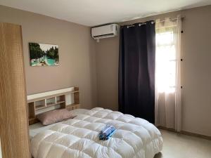 Letto o letti in una camera di Residence 1129 - Block 1