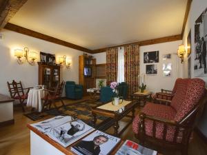 Гостиная зона в Hotel De La Poste