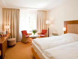 Postel nebo postele na pokoji v ubytování Hotel Birke, Ringhotel Kiel