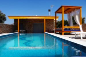 The swimming pool at or close to Traounou Serenity Villa