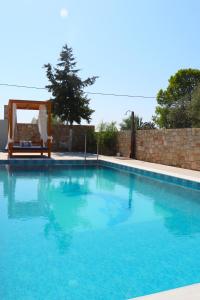 The swimming pool at or close to Traounou Serenity Villa
