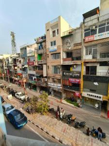 an overhead view of a city street with buildings at Oyo Hotel Luxury Inn Near Dhaula Kuan Delhi in New Delhi
