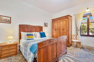 Posteľ alebo postele v izbe v ubytovaní Un'Ottima Annata B&B
