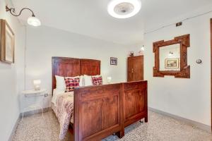 Posteľ alebo postele v izbe v ubytovaní Un'Ottima Annata B&B