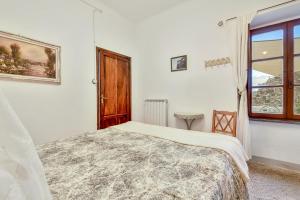 Posteľ alebo postele v izbe v ubytovaní Un'Ottima Annata B&B